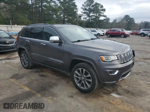 2017 Jeep Grand Cherokee Overland with VIN 1C4RJECG2HC903366, listed as a Copart auction lot 44140155 with 102,459 mi miles and Salvage title. Bid and sale history available at DreamBid. Image 4.