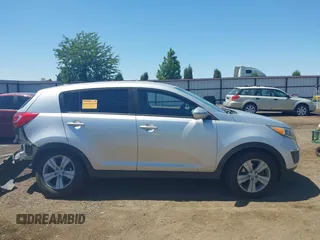 2013 Kia Sportage LX with VIN KNDPBCA24D7352828, listed as a IAAI auction lot 42685744 with 156,805 mi miles and . Bid and sale history available at DreamBid. Image 13.