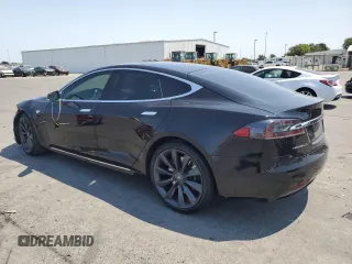2016 Tesla Model S 90D z VIN 5YJSA1E29GF158774, wystawiony jako Copart lot #60143405 z przebiegiem Nie podano mil oraz Szkoda całkowita • Salvage title. Historia ofert i sprzedaży dostępna na DreamBid. Obrazek 2.
