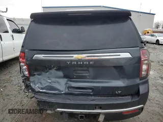 2022 Chevrolet Tahoe LT with VIN 1GNSKNKD0NR161796, listed as a Copart auction lot 42320075 with 84,387 mi miles and Salvage title. Bid and sale history available at DreamBid. Image 6.