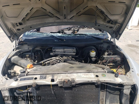 2000 Dodge 1500 z VIN 3B7HF12Z8YG160976, wystawiony jako Copart lot #55044765 z przebiegiem 362 570 mil mil oraz Szkoda całkowita • Salvage title. Historia ofert i sprzedaży dostępna na DreamBid. Obrazek 11.
