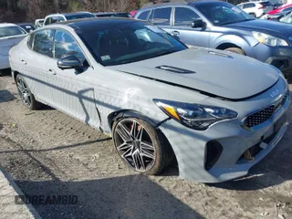 2023 Kia Stinger GT2 with VIN KNAE55LC6P6133652, listed as a IAAI auction lot 41230877 with 15,953 mi miles. Bid and sale history available at carsss.com. Image 1.