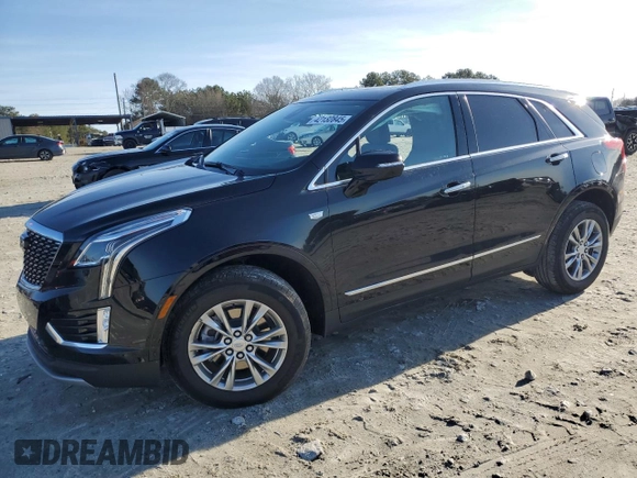 2023 Cadillac XT5 FWD Premium Luxury with VIN 1GYKNCR48PZ132957, listed as a Copart auction lot 42132845 with 27,312 mi miles and Salvage Title. Bid and sale history available at carsss.com. Image 1.