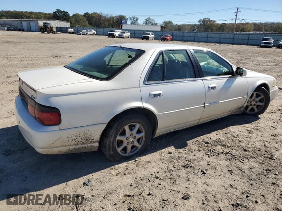 2003 Cadillac Seville Luxury SLS z VIN 1G6KS54Y13U261492, wystawiony jako Copart lot #80113764 z przebiegiem 184 880 mil mil oraz Szkoda całkowita • Salvage title. Historia ofert i sprzedaży dostępna na DreamBid. Obrazek 3.