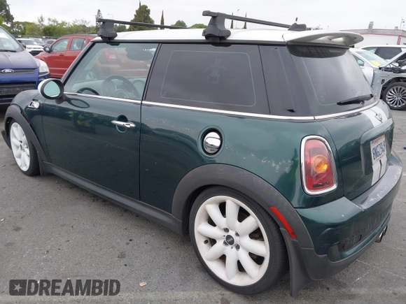 2009 MINI Hardtop S with VIN WMWMF735X9TT94065, listed as a IAAI auction lot 42183487 with 141,746 mi miles and . Bid and sale history available at DreamBid. Image 3.