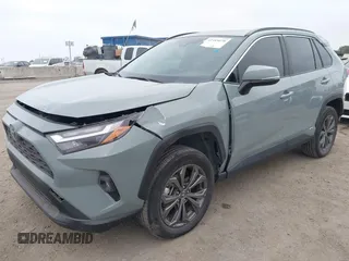 2022 Toyota RAV4 Hybrid XLE Premium with VIN 4T3B6RFV8NU102695, listed as a IAAI auction lot 42385078 with 35,614 mi miles and . Bid and sale history available at DreamBid. Image 2.