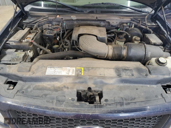 2002 Ford F-150 XL with VIN 1FTRX18L62NA69837, listed as a Copart auction lot 61581935 with 130,078 mi miles and Salvage title. Bid and sale history available at DreamBid. Image 11.