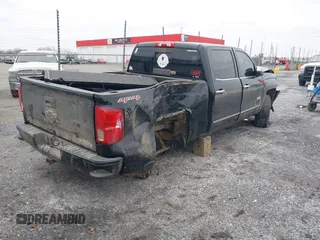 2016 Chevrolet Silverado 1500 High Country with VIN 3GCUKTEC2GG366838, listed as a IAAI auction lot 41258249 with 160,460 mi miles and . Bid and sale history available at DreamBid. Image 4.