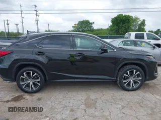 2021 Lexus RX 350 z VIN 2T2HZMAA8MC183615, wystawiony jako IAAI lot #42097557 z przebiegiem 56 470 mil mil oraz . Historia ofert i sprzedaży dostępna na DreamBid. Obrazek 13.