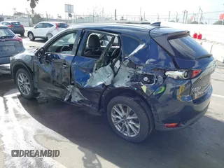 2021 Mazda CX-5 Grand Touring with VIN JM3KFBDM6M1312573, listed as a IAAI auction lot 41936739 with Not Provided miles and . Bid and sale history available at DreamBid. Image 3.