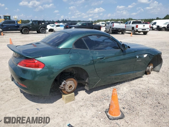 2011 BMW Z4 sDrive30i with VIN WBALM5C55BE495921, listed as a Copart auction lot 71453304 with 116,136 mi miles and Salvage Title. Bid and sale history available at carsss.com. Image 3.