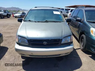 1999 Toyota Sienna LE with VIN 4T3ZF13C3XU109706, listed as a IAAI auction lot 42034205 with 1 mi miles. Bid and sale history available at carsss.com. Image 6.
