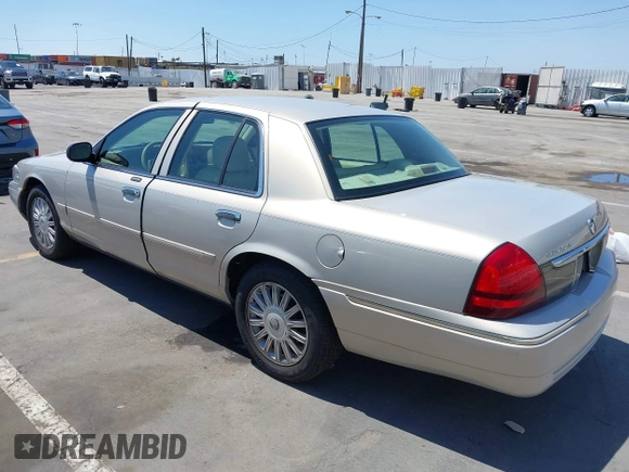 2008 Mercury Grand Marquis LS z VIN 2MEFM75V08X662376, wystawiony jako IAAI lot #42414652 z przebiegiem 86 537 mil mil oraz . Historia ofert i sprzedaży dostępna na DreamBid. Obrazek 3.