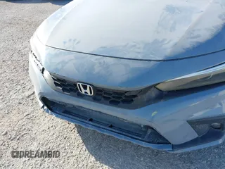 2022 Honda Civic Sport Touring z VIN 19XFL1G89NE009751, wystawiony jako IAAI lot #41845803 z przebiegiem Nie podano mil oraz . Historia ofert i sprzedaży dostępna na DreamBid. Obrazek 6.
