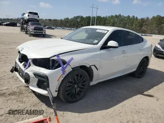 2022 BMW X6 xDrive40i with VIN 5UXCY6C0XN9K78927, listed as a Copart auction lot 48348335 with 63,074 mi miles and Salvage Title. Bid and sale history available at carsss.com. Image 1.