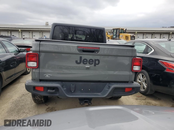 2022 Jeep Gladiator Willys с VIN 1C6HJTAG8NL107002, выставлен на аукционе Copart как лот 85138204 с пробегом 69 166 миль миль и Списание • Salvage title. История ставок и продаж доступна на DreamBid. Изображение 6.