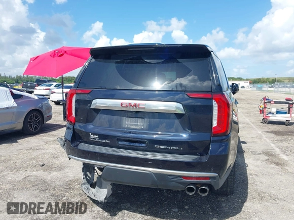 2021 GMC Yukon Denali with VIN 1GKS2DKL7MR471280, listed as a IAAI auction lot 40189766 with 126,591 mi miles. Bid and sale history available at carsss.com. Image 16.