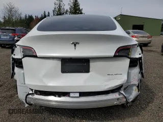 2023 Tesla Model Y Long Range with VIN 7SAYGDEE6PA101291, listed as a Copart auction lot 52758115 with 7,250 mi miles and Salvage Title. Bid and sale history available at DreamBid. Image 6.