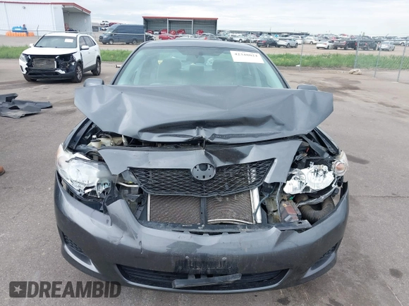 2010 Toyota Corolla with VIN 2T1BU4EEXAC483724, listed as a IAAI auction lot 42348024 with 140,543 mi miles and . Bid and sale history available at DreamBid. Image 6.