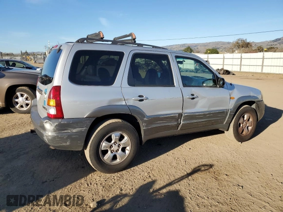 2001 Mazda Tribute LX with VIN 4F2CU08111KM20113, listed as a Copart auction lot 87681195 with 144,400 mi miles and Salvage Title. Bid and sale history available at DreamBid. Image 3.