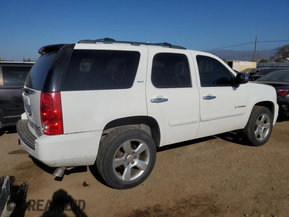 2008 GMC Yukon SLT 4SA z VIN 1GKFK13028J192313, wystawiony jako Copart lot #89207235 z przebiegiem 240 812 mil mil oraz Szkoda całkowita • Salvage title. Historia ofert i sprzedaży dostępna na DreamBid. Obrazek 3.