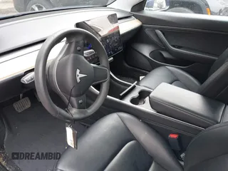 2020 Tesla Model 3 Standard Range Plus with VIN 5YJ3E1EA1LF658521, listed as a IAAI auction lot 41804722 with 83,248 mi miles and . Bid and sale history available at DreamBid. Image 5.