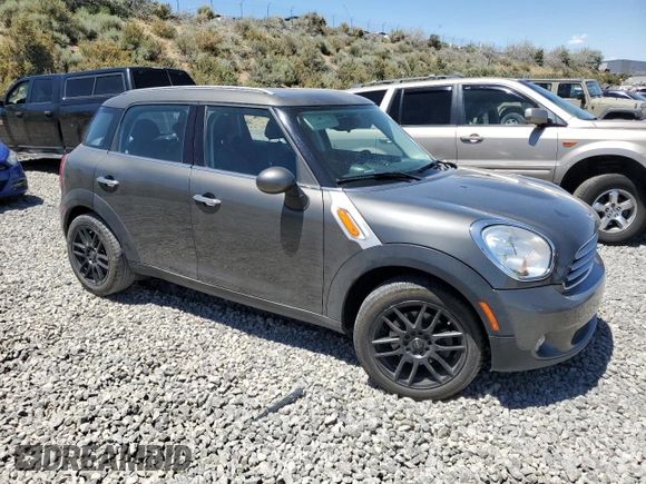 2014 MINI Countryman with VIN WMWZB3C56EWR38919, listed as a Copart auction lot 61385865 with 127,368 mi miles and Salvage title. Bid and sale history available at DreamBid. Image 4.
