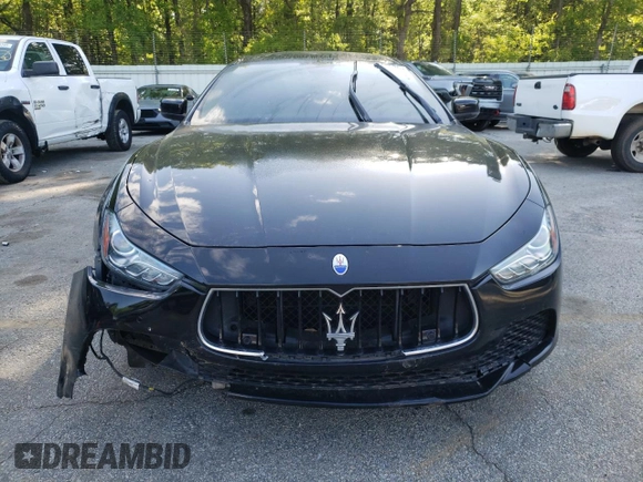 2016 Maserati Ghibli S с VIN ZAM57RSA2G1181033, выставлен на аукционе Copart как лот 52780575 с пробегом 105 266 миль миль и Списание • Salvage title. История ставок и продаж доступна на DreamBid. Изображение 5.