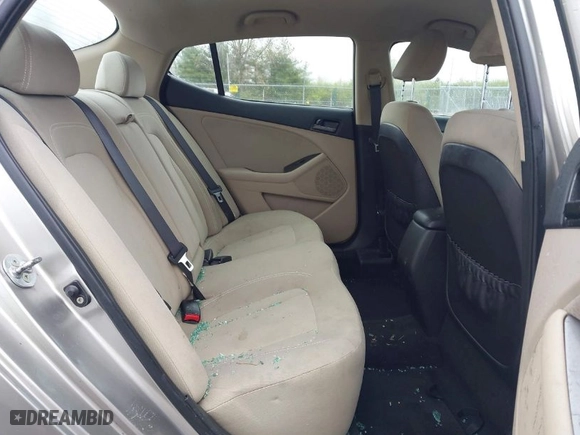 2011 Kia Optima LX with VIN KNAGM4A76B5146718, listed as a IAAI auction lot 42006225 with 213,939 mi miles. Bid and sale history available at carsss.com. Image 8.