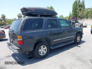 2005 Chevrolet Tahoe LS z VIN 1GNEK13T15J263926, wystawiony jako IAAI lot #42497774 z przebiegiem 342 968 mil mil oraz . Historia ofert i sprzedaży dostępna na DreamBid. Obrazek 4.