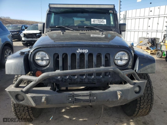 2008 Jeep Wrangler Unlimited Sahara with VIN 1J4GA59108L654912, listed as a Copart auction lot 48170345 with 114,638 mi miles and Salvage Title. Bid and sale history available at carsss.com. Image 5.