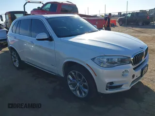 2014 BMW X5 xDrive35i z VIN 5UXKR0C52E0H28420, wystawiony jako IAAI lot #41392640 z przebiegiem 132 772 mil mil oraz . Historia ofert i sprzedaży dostępna na DreamBid. Obrazek 1.