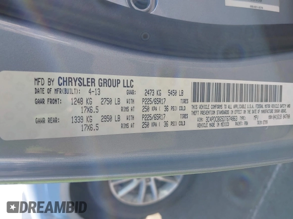 2013 Dodge Journey SXT with VIN 3C4PDCBG5DT674863, listed as a IAAI auction lot 41670225 with 207,524 mi miles. Bid and sale history available at carsss.com. Image 9.