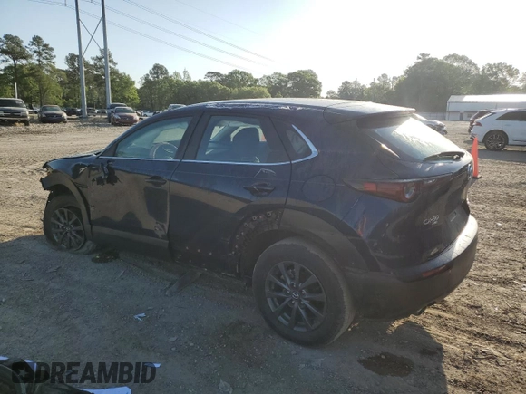 2023 Mazda CX-30 S with VIN 3MVDMBAM1PM566211, listed as a Copart auction lot 52549525 with 36,382 mi miles and Salvage title. Bid and sale history available at DreamBid. Image 2.