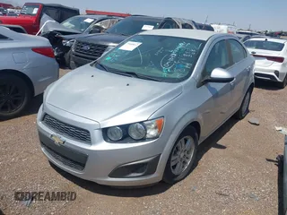 2014 Chevrolet Sonic LT with VIN 1G1JC5SH1E4229324, listed as a IAAI auction lot 39945012 with Not Provided miles and . Bid and sale history available at DreamBid. Image 2.