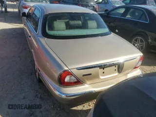 2005 Jaguar XJ with VIN SAJWA79C05SG46913, listed as a Copart auction lot 75092794 with 0 mi miles and Salvage Title. Bid and sale history available at carsss.com. Image 6.
