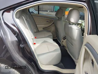 2013 Ford Taurus SEL with VIN 1FAHP2E87DG220389, listed as a IAAI auction lot 41930118 with 128,324 mi miles and . Bid and sale history available at carsss.com. Image 8.