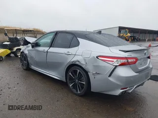 2020 Toyota Camry XSE with VIN 4T1K61AK1LU318098, listed as a IAAI auction lot 41097712 with 64,118 mi miles and . Bid and sale history available at DreamBid. Image 3.