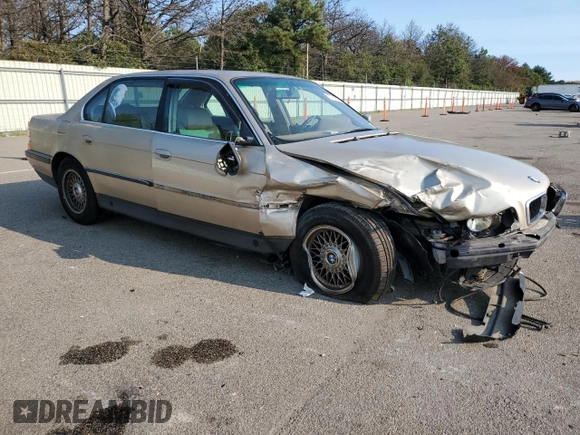1997 BMW 7 Series 740il with VIN WBAGJ8325VDM04352, listed as a Copart auction lot 70189534 with 129,463 mi miles and Salvage Title. Bid and sale history available at carsss.com. Image 4.