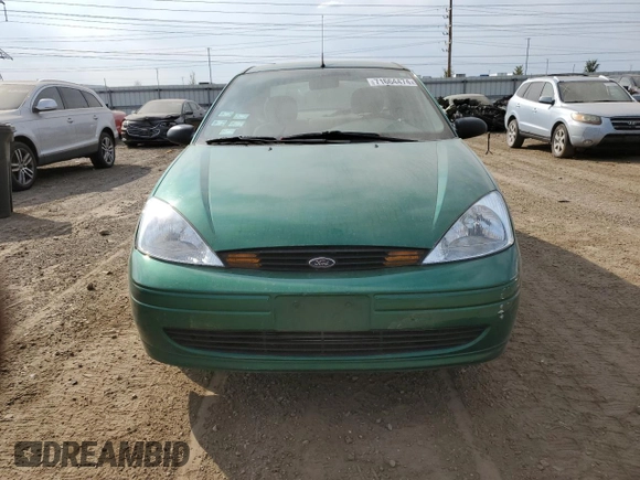 2002 Ford Focus LX with VIN 1FAFP33PX2W150929, listed as a Copart auction lot 71664474 with 61,505 mi miles and Salvage Title. Bid and sale history available at DreamBid. Image 5.