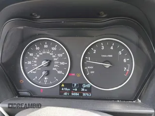 2015 BMW 2 Series 228i with VIN WBA1F9C56FVW98461, listed as a IAAI auction lot 41663193 with 94,584 mi miles. Bid and sale history available at carsss.com. Image 7.