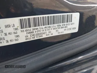 2013 Chrysler Town & Country Touring with VIN 2C4RC1BG8DR594671, listed as a IAAI auction lot 42039026 with 208,909 mi miles. Bid and sale history available at carsss.com. Image 9.