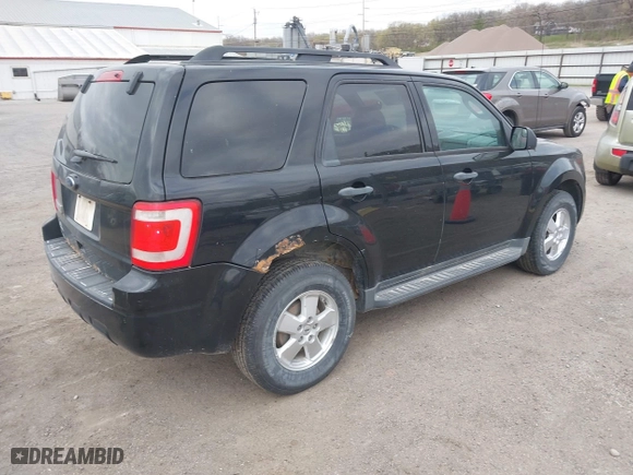 2012 Ford Escape XLT with VIN 1FMCU0D72CKC02397, listed as a IAAI auction lot 42042886 with 261,627 mi miles. Bid and sale history available at carsss.com. Image 4.