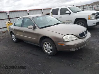 2003 Mercury Sable LS Premium with VIN 1MEFM55S03G631198, listed as a IAAI auction lot 41813963 with 144,970 mi miles. Bid and sale history available at carsss.com. Image 1.