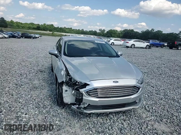2017 Ford Fusion SE z VIN 3FA6P0H74HR164747, wystawiony jako Copart lot #56139855 z przebiegiem 105 769 mil mil oraz Szkoda całkowita • Salvage title. Historia ofert i sprzedaży dostępna na DreamBid. Obrazek 13.