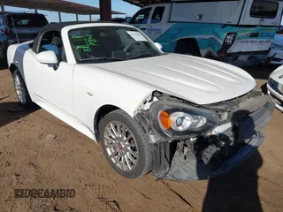 2018 FIAT 124 Spider Abarth z VIN JC1NFAEK9J0137571, wystawiony jako IAAI lot #42333604 z przebiegiem 31 532 mil mil oraz . Historia ofert i sprzedaży dostępna na DreamBid. Obrazek 1.
