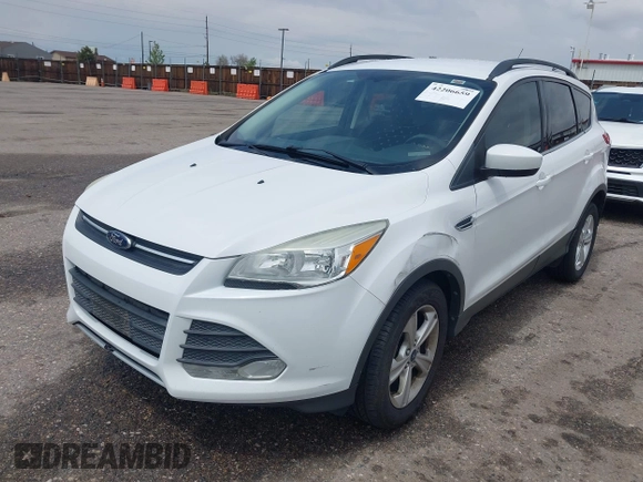 2014 Ford Escape SE with VIN 1FMCU9GX6EUD51032, listed as a IAAI auction lot 42206659 with 131,438 mi miles and . Bid and sale history available at DreamBid. Image 2.