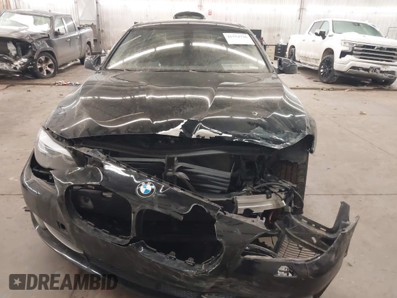 2011 BMW 5 Series 535i xDrive with VIN WBAFU7C58BC778429, listed as a IAAI auction lot 41554736 with 129,163 mi miles. Bid and sale history available at carsss.com. Image 13.