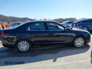 2010 Ford Fusion Hybrid z VIN 3FADP0L39AR396746, wystawiony jako IAAI lot #41764282 z przebiegiem 132 582 mil mil oraz . Historia ofert i sprzedaży dostępna na DreamBid. Obrazek 13.