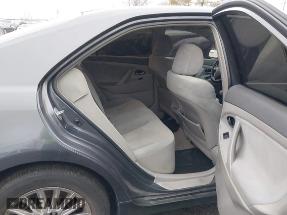 2009 Toyota Camry LE z VIN 4T1BK46K49U093612, wystawiony jako IAAI lot #41847395 z przebiegiem 250 383 mil mil oraz . Historia ofert i sprzedaży dostępna na DreamBid. Obrazek 8.